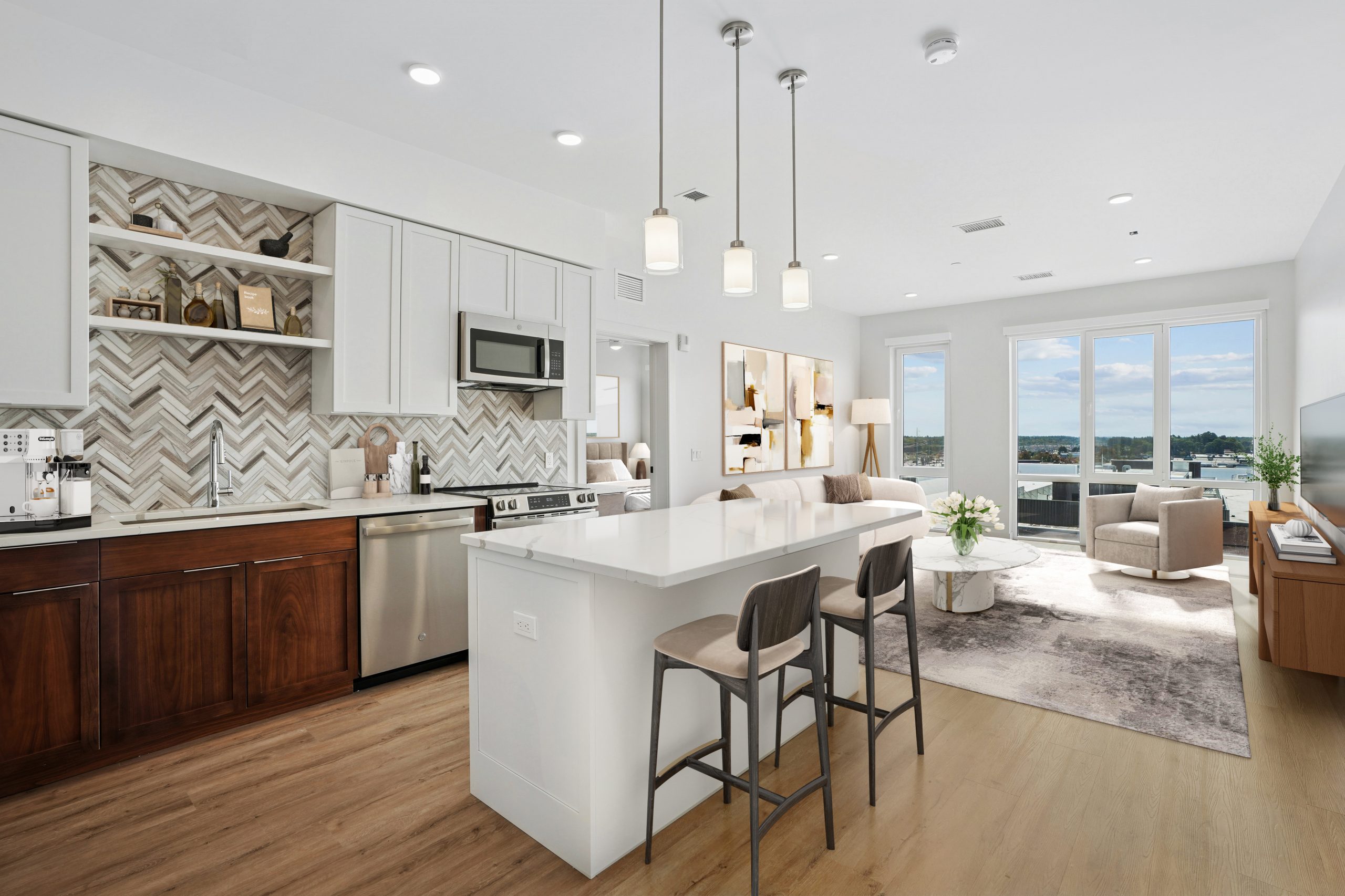 Living room, dining room, & kitchen in one of Epicurean's luxury apartments in Salem, NH